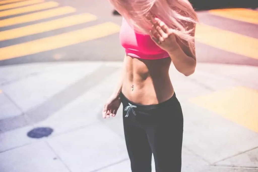 Woman with toned stomach after LA-EMS Body Sculpting Treatment Vauxhall